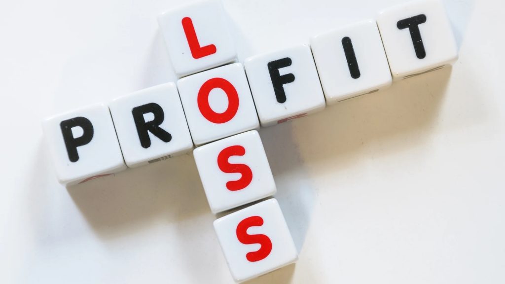 Crossword style layout of dice with letters instead of numbers, representing "profit" and "loss" intersecting at the "o" in both words.